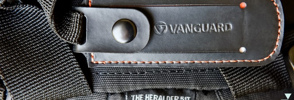 Vanguard Heralder 51T product review showing branded name tag of camera bag, images by Natalie Field.